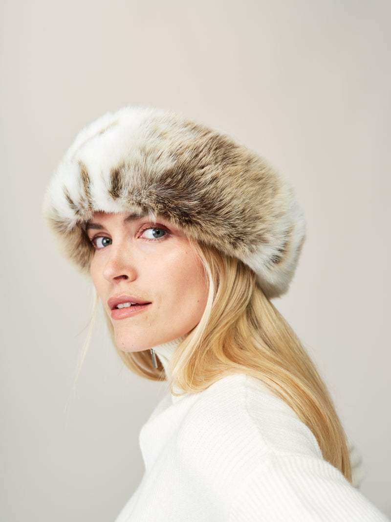 Model wearing Lynx faux fur Brim hat by Helen Moore