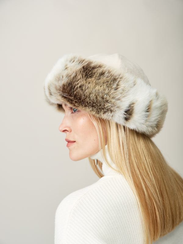 Model wearing Lynx faux fur Brim hat by Helen Moore