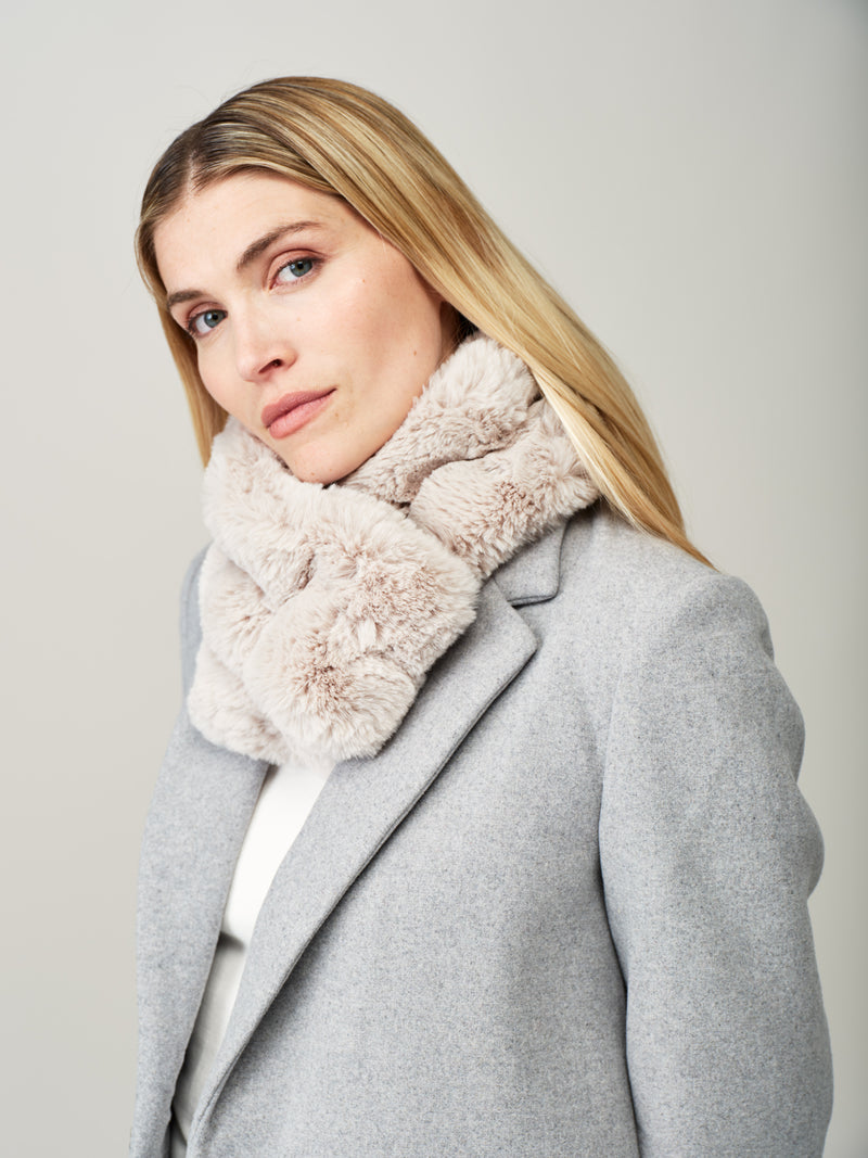 Model wearing Mist Cloud faux fur Ruffle scarf by Helen Moore