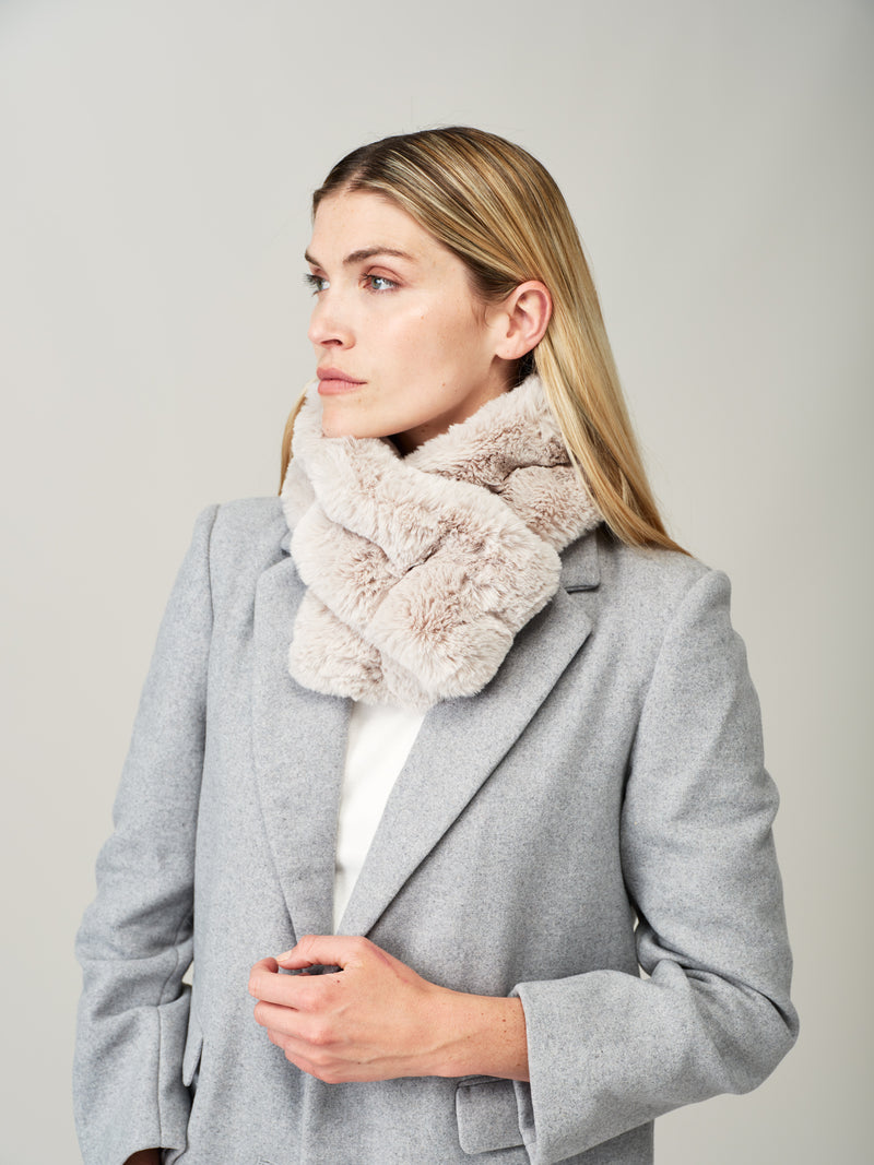 Model wearing Mist Cloud faux fur Ruffle scarf by Helen Moore