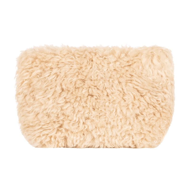 Cream faux sheepskin make up bag by Helen Moore